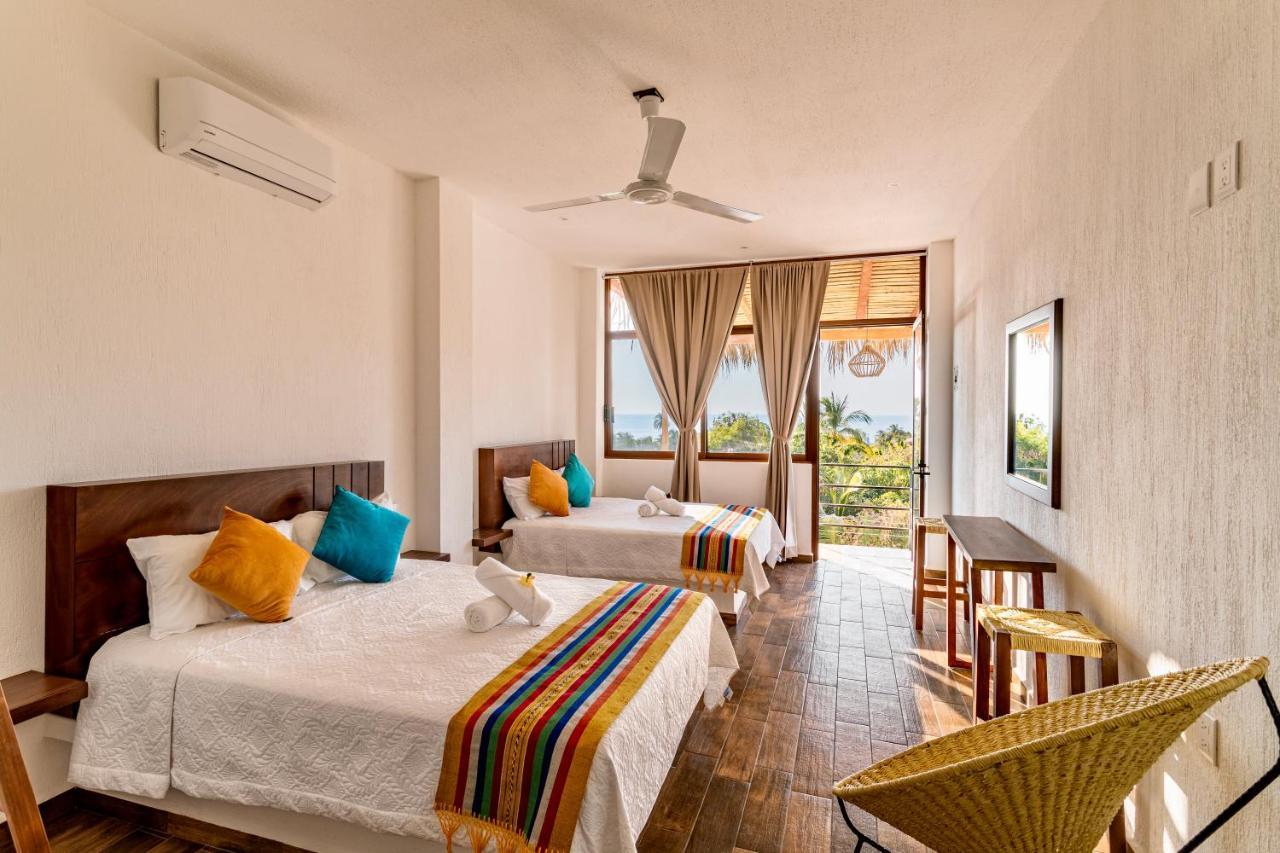 Punta Kai Hotel & Hostal プエルト・エスコンディード エクステリア 写真